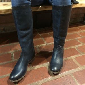 Frye Navy tall buckle zip with lower buckle strap.